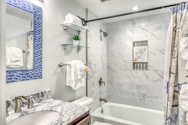 Elegant Full Bathroom With Marble Accents
