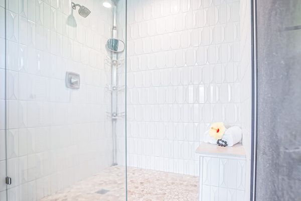 Spa-like primary ensuite bathroom with modern finishes