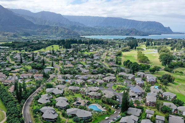 Aerial view highlighting the property's scenic mountain backdrop