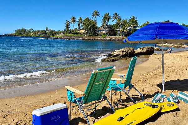 Chairs, umbrella, towels, cooler and boards - ready for our day in the sun.