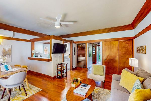 Living room with a comfortable sofa bed for any extra company and a flat screen tv.