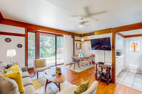 Living room with a comfortable sofa bed for any extra company and a flat screen tv.