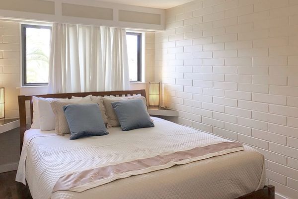 Master bedroom with king bed and lots of natural light.