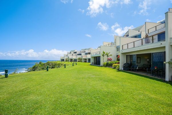 Open oceanfront lawn perfect for relaxing outdoors
