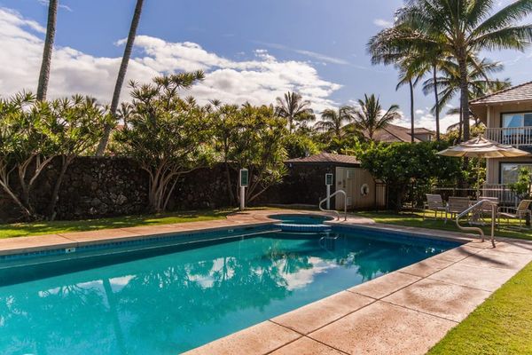 Lounge by the pool with cool island breezes