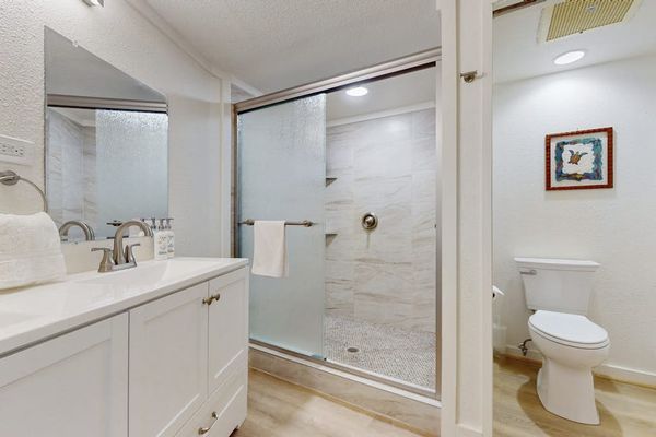 Refreshing Primary En-Suite With Custom Glass Walk-In Shower