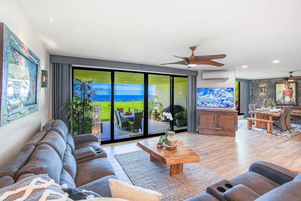 Relax in the living room while enjoying panoramic ocean views