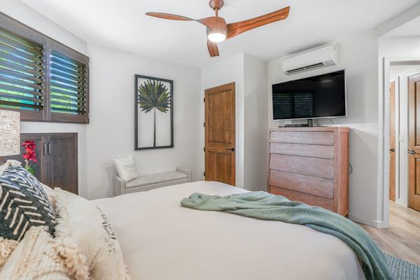 Comfortable guest retreat with a TV and ample storage