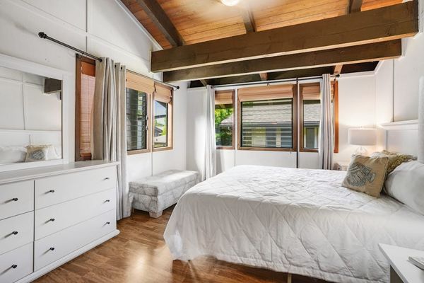 Inviting guest bedroom featuring a comfortable king bed.