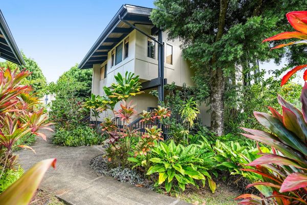 Immerse yourself in Kauai's lush, jungle-like landscape as you stroll through this tropical paradise.