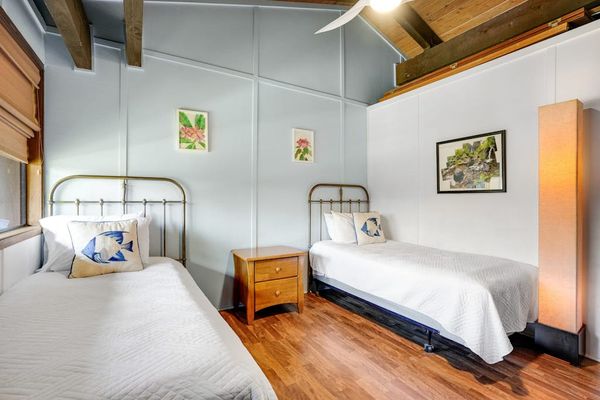 Guest bedroom featuring two twin beds.