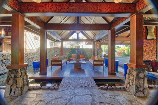Pavilion offers comfortable seating, natural light, and tropical garden views