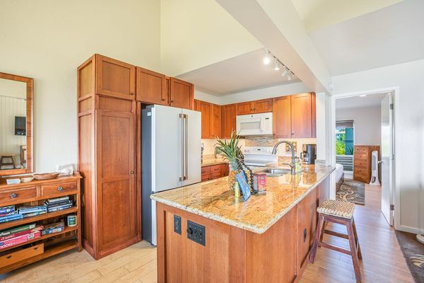 Large kitchen with plenty of counter space for cooking.
