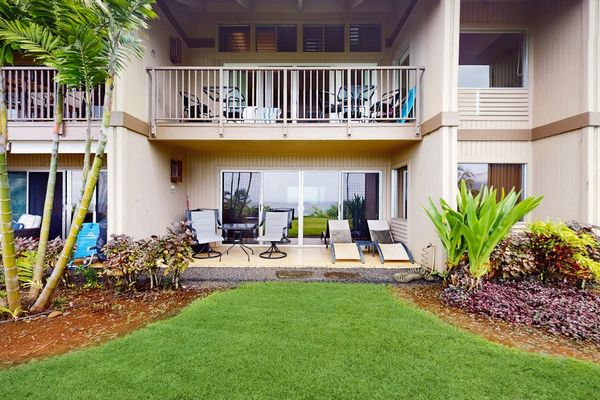 Distinctive exterior design blends natural textures with expansive coastal views