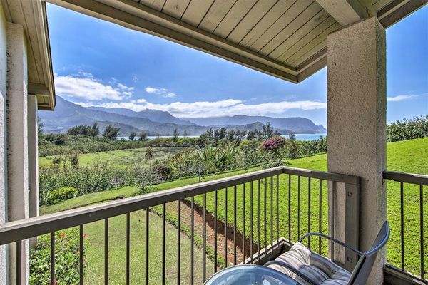 Enjoy fresh island breezes and sweeping mountain views from balcony