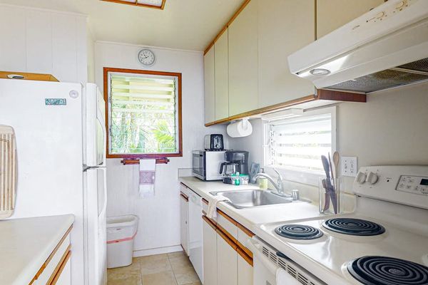 Well-equipped kitchen with modern appliances and ample counter space.