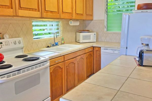 Bright kitchen offering plenty of space to prepare your favorite meals.