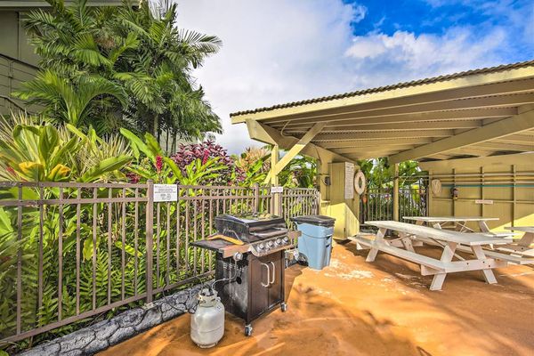 Fire up the grill in the community BBQ area with outdoor seating.