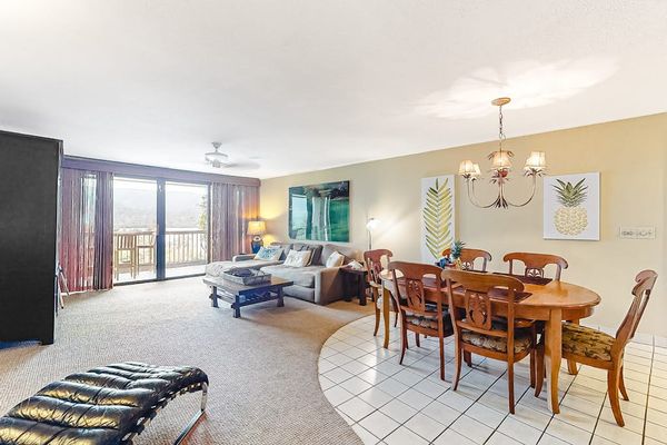 Open living and dining space creates an inviting vacation atmosphere