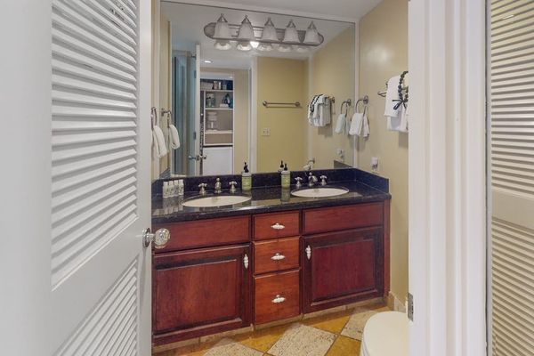 Bright bathroom vanity makes getting ready simple throughout your stay