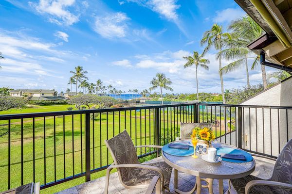 Private Lanai Dining Setup with Golf Course & Ocean Horizon Views
