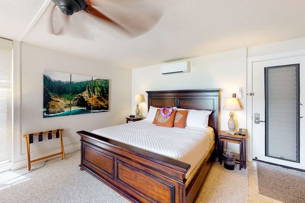Rest and recharge in this welcoming bedroom after exploring paradise