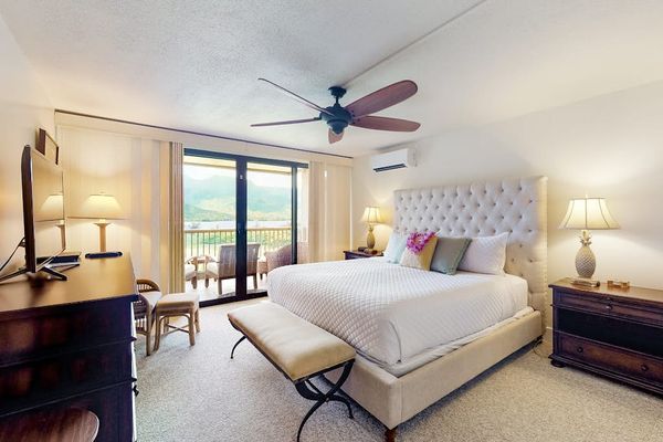 Rest peacefully in this inviting bedroom with bright natural surroundings