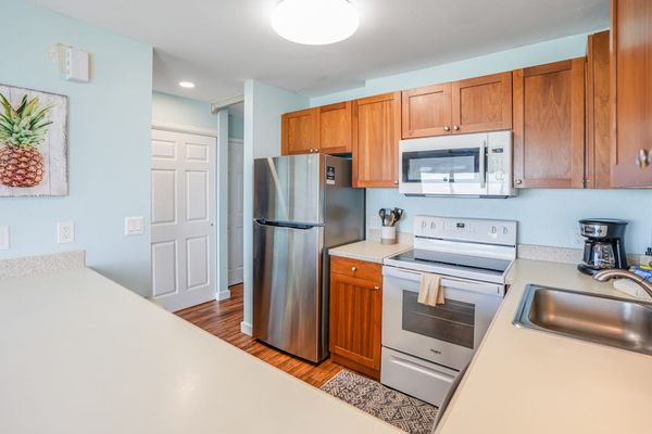 Modern Kitchen With Warm Wood Cabinetry