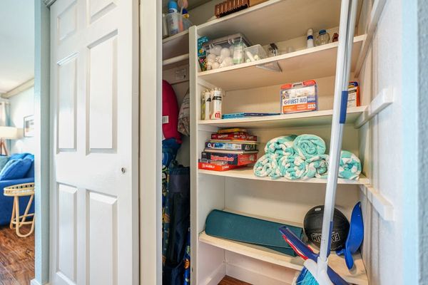 Organized Storage Closet With Guest Essentials