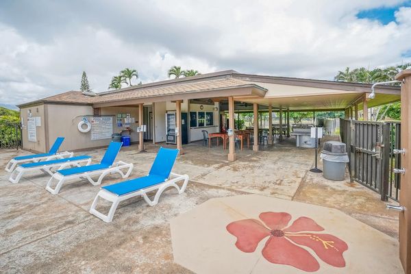 Inviting Poolside Area With Tropical Scenery