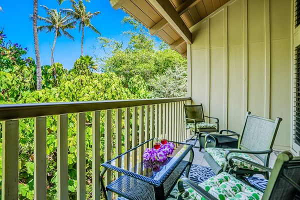 Sit in the morning and drink your coffee while taking in this lush tropical paradise.