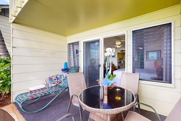 Private lanai offering a cozy spot to unwind after a day of exploring.