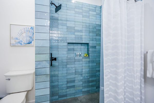 Walk-in shower with stylish tile accents