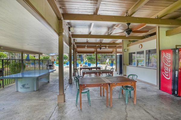 Pono Kai Resort, includes 12-acre grounds, an outdoor pool, a hot tub, a shuffleboard area, a barbecue facility with gas grills, a sauna, golf putting greens, Ping-Pong tables, a croquet lawn, a fitness center, tennis courts, and laundry facilities.