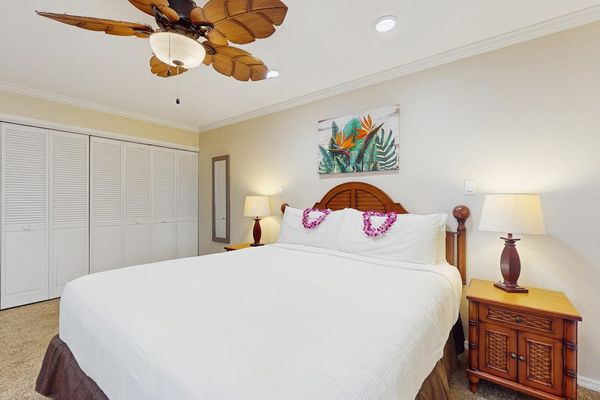 Large master bedroom with king bed, flat screen tv and en-suite bathroom.