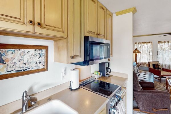 Well Equipped Kitchen With Island Appeal