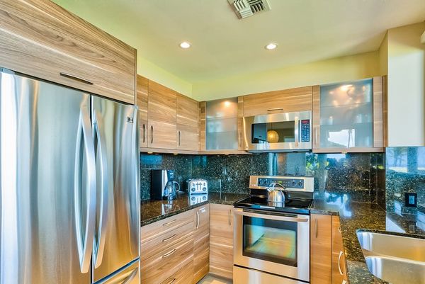 Fabulously remodeled new kitchen with stainless steel appliances and granite countertops.