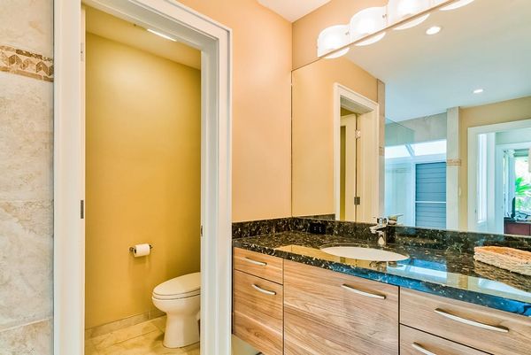 Master bathroom with newly remodeled large walk-shower and double sinks.