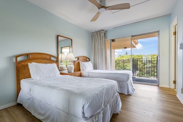 Just as much comfort for the guests - two twin beds with access to your private lanai.