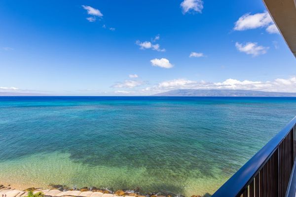 Private lanai - glorious views of the tropical waters of the Pacific Ocean.  Unwind with a glass of wine and the ocean breeze.