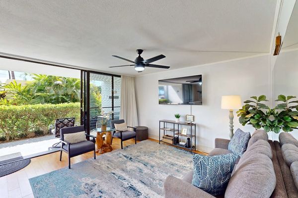 Sunlit Living Room Opening to Private Patio