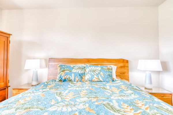 Cozy bedroom with colorful tropical-inspired bedding