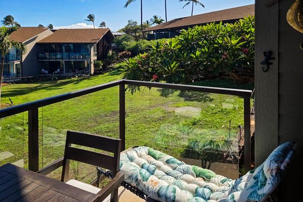 Private Balcony Overlooking Lush Gardens