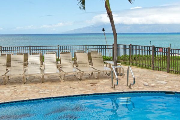 Oceanfront pool featuring a poolside BBQ area.