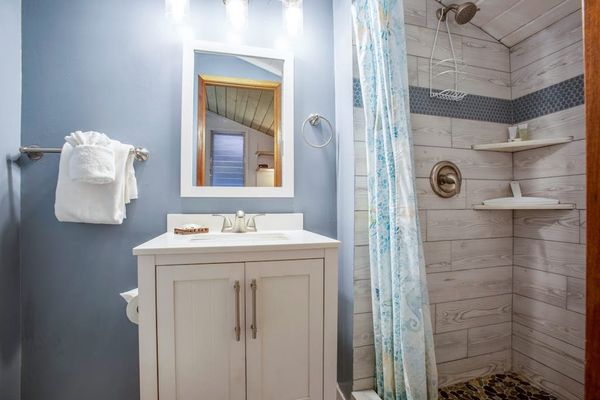 Guest bathroom with walk-in shower.