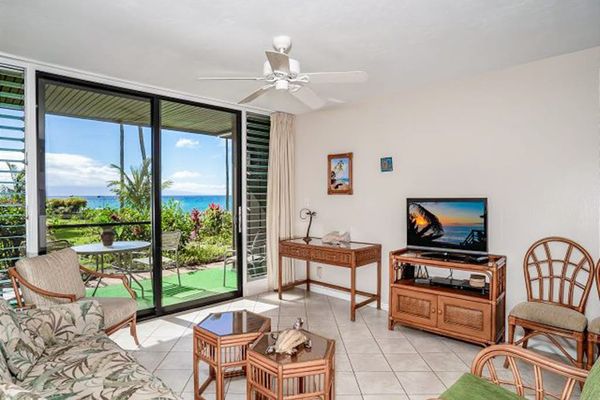 Living room with comfortable sofa bed and a flat screen tv for your enjoyment.
