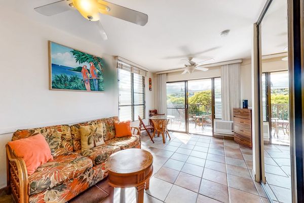 Cozy studio with a comfortable sofa, offering a welcoming space to relax and unwind