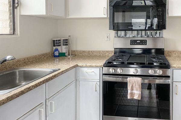 Fully equipped kitchen with generous counter space for preparing your favorite meals with ease