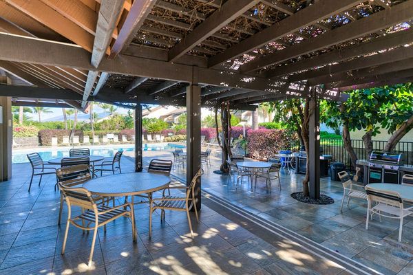 Tropical resort grounds showcase palms pathways and lush island landscaping