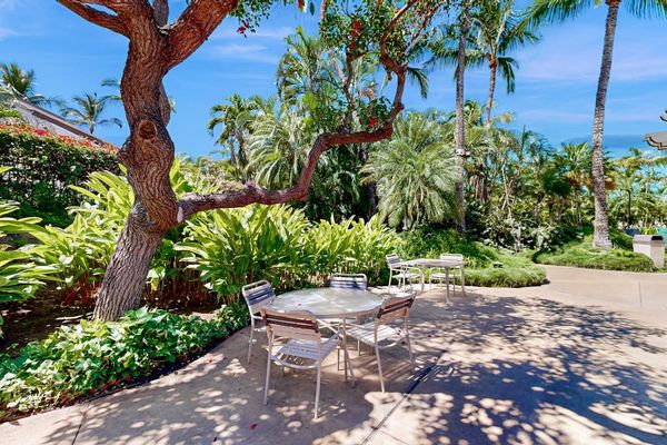 Garden barbecue area makes casual grilling convenient beneath island skies